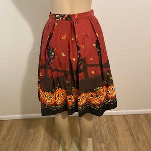Pinup Girl Clothing Pinup Couture Jenny Skirt in Pumpkin Border Print Black Cats